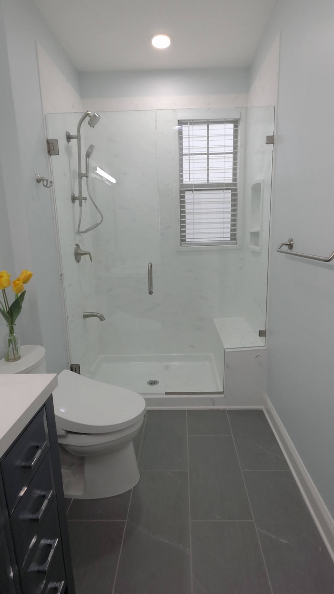Frameless glass walk-in shower — representative work by Greaves Construction, near Garner, NC.